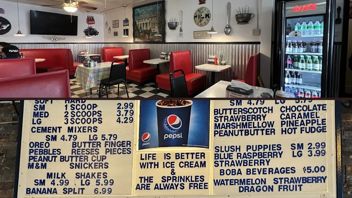 Coffee cups beside a breakfast counter.
